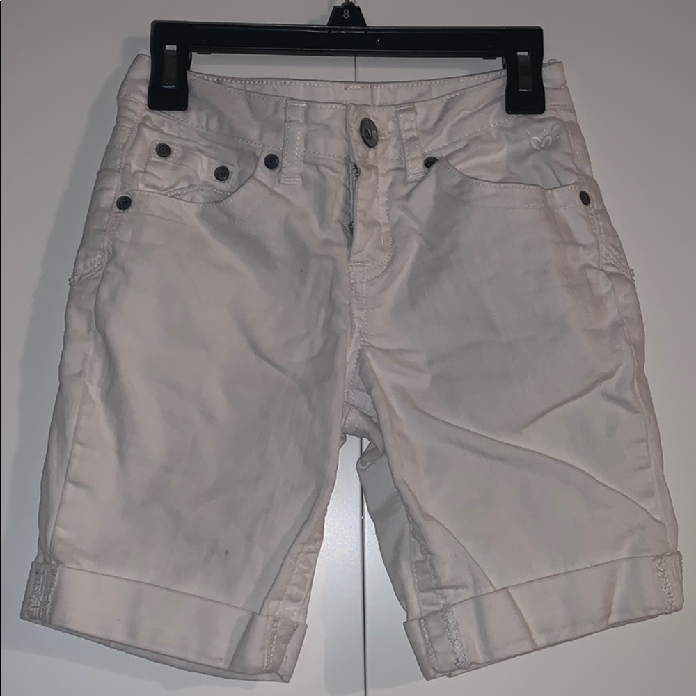 Girls white shorts.